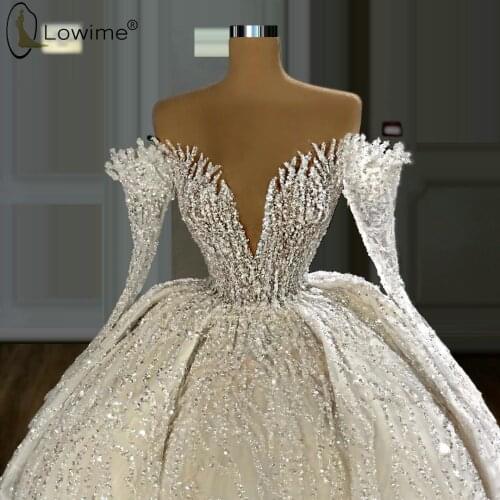 Dubai Sparkly Sexy V Neck Wedding Dresses 2020 Long Sleeve Luxury Full Beading Bridal Gowns Custom Made