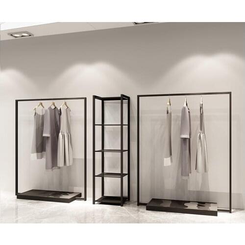 Clothes hanger. Display rack. Mens and womens clothing racks. Shelves. Display cabinets.056