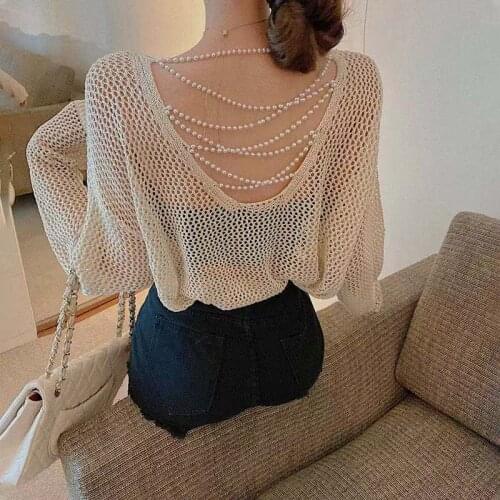 BaoZhuo Sexy Hole Sweater Spring Summer Autumn Backless Cross Pearl Pullovers 2021 Hollow Out Thin Knit Long Sleeve Sweater