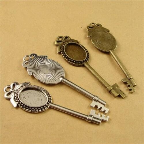 40pcs/lot Vintage Oval Cabochon Base Key Charms 18*13MM Inner Size Bow-Knot Cameo Settings for Jewelry Making
