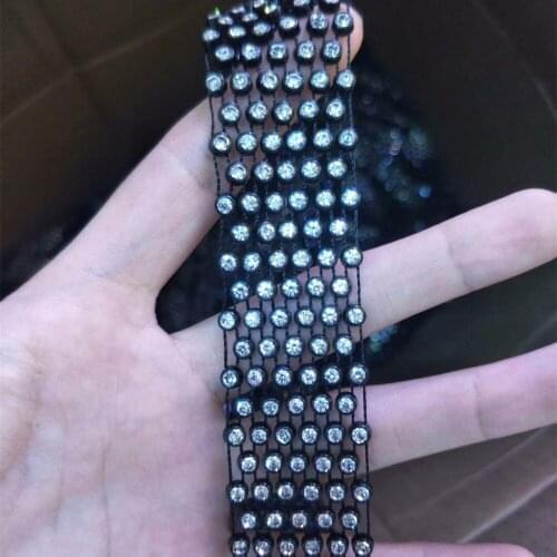 Free shipping plastic crystal fishnet fabrics 3mm black ling with crystal clear stones
