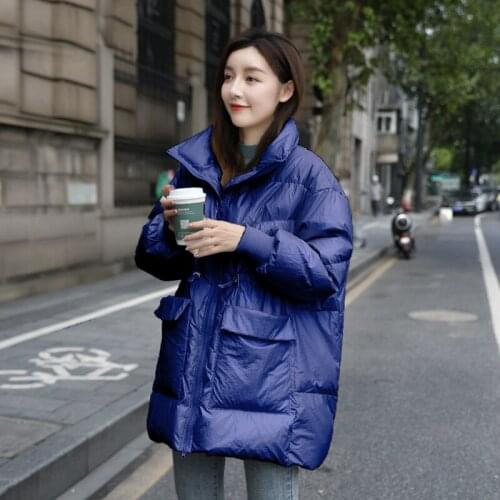 Pu leather jacket in 2020 the new female disposable favors big yards han edition loose waist white duck down jacket