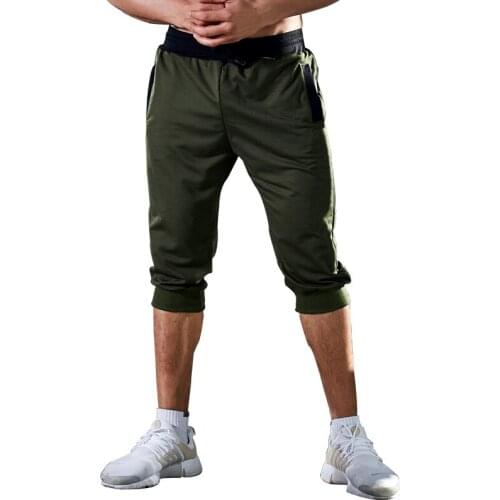 New mens shorts solid color five-point pants running jogging outdoor fitness sports pants cotton beam feet pants