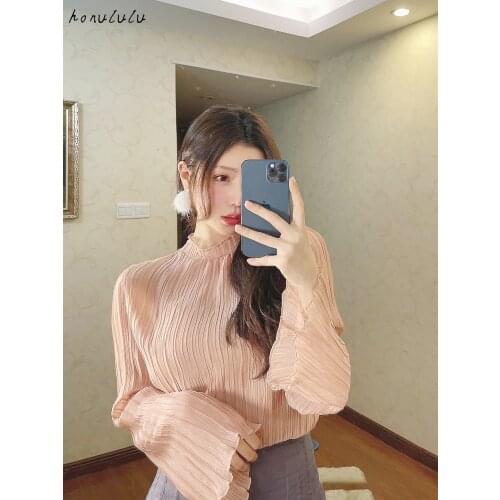 2021 spring and summer new Japanese womens temperament fungus side trumpet sleeve pleated chiffon shirt top
