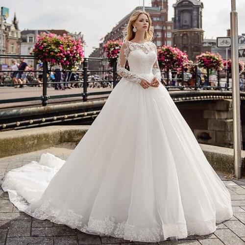 Luxury Long Sleeves Ball Gown Wedding Dresses Illusion Scoop White Lace Appliques Buttons Corset Back Formal Bridal Dress 2021