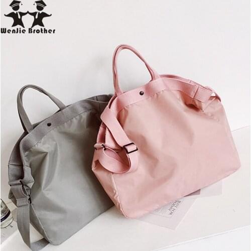 Wenjie brother new travel bag female hand luggage bag men Large-capacity travel bag light pink waterproof gym bag for couple