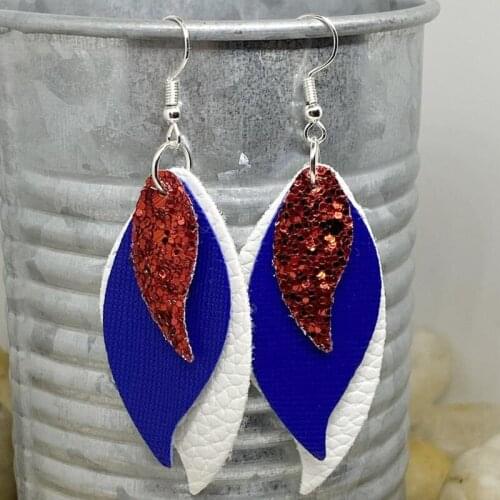 Wavy leaf earrings with white faux leather, blue faux leather and red chunky glitter with ear hooks measuring