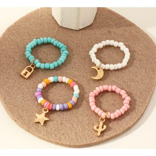 4Pcs/set Boho Colorful Rice Beads Rings Set For Women Elastic Adjustable Ring Girls New Fashion Star Conch Shell Pendant Jewelry