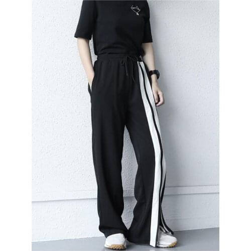 Ladies summer thin black stripe slit design sports couples in the same street casual loose large leg pants