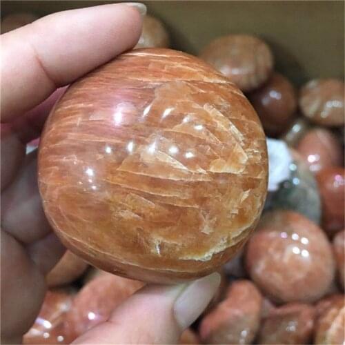 Natural polished crystal orange moonstone crystal palm stone for home decoration