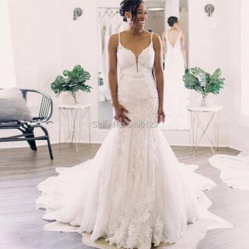 Charming Spaghetti Strap Wedding Dresses 2020 V-neck Gorgeous Lace Appliques Backless White Ivory Corset Mermaid Bridal Dress