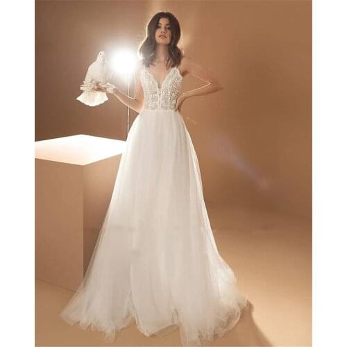 Boho Beach Wedding Dresses 2021 Spaghetti Straps Backless Bow A Line Bridal Gowns Elegant Sweep Train Lace And Tulle New Design