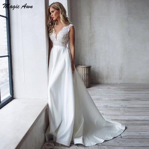 Magic Awn Elegant Lace Satin Wedding Dresses 2021 Boho V-Neck Backless A-Line Beach Bridal Gowns Sweep Train Princess Vestidos