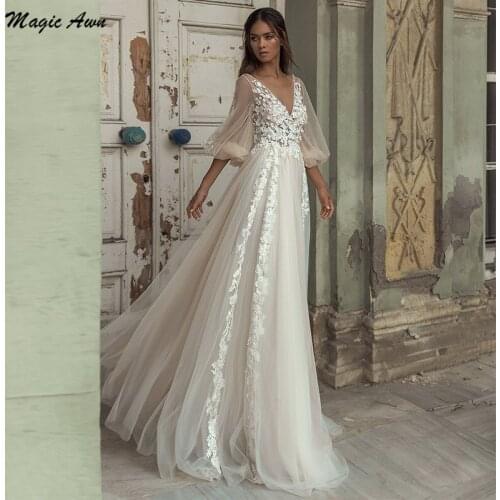 Magic Awn Western Country Tulle Wedding Dresses With Puff Sleeves Lace 3D Appliques Illusion Boho Beach Mariage Gowns Princess