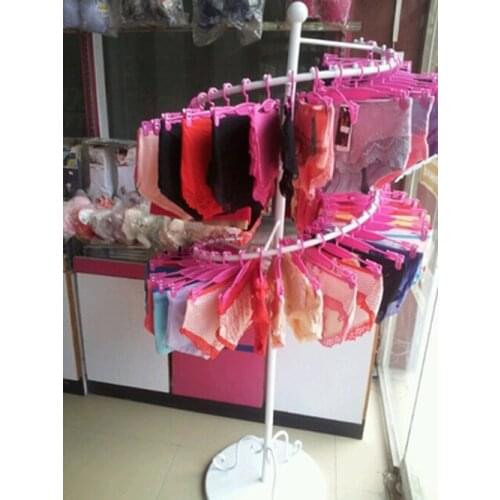 Quality goods bag mail , wrought iron within the rotating racks, display shelf bra console underwear underwear rack shelf