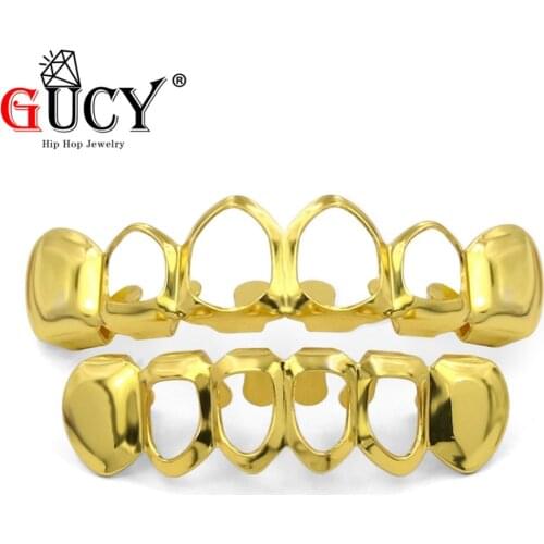 GUCY New Fit Gold Color Plated Teeth Grills Vampire Four Opened Face Hollow Teeth Grillz Caps Set For Christmas Gift