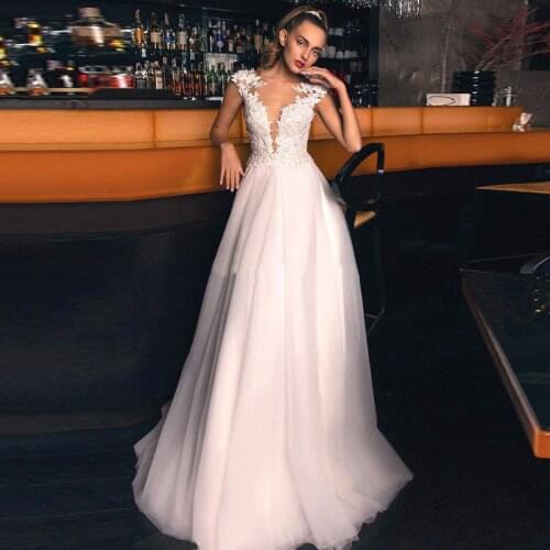 Sheer O-Neck Lace Appliques A Line Tulle Wedding Dresses Sexy See Through Buttons Back Bridal Gowns Marriage Dress 2021 Long