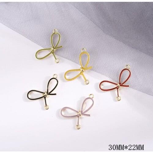 Wholesale 50pcs/lot alloy drop oil Double hanging cartoon bow shape metal floating locket charms diy jewelry earring accessory