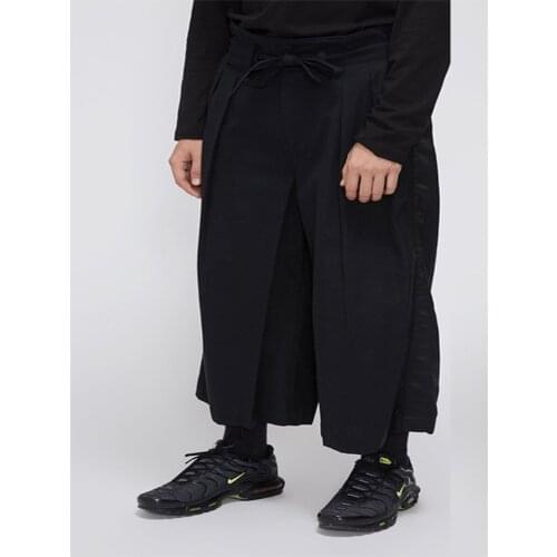 Spring and Autumn new mens pure color loose casual wide-leg pants culottes trouser line bright black paste straight pants belt