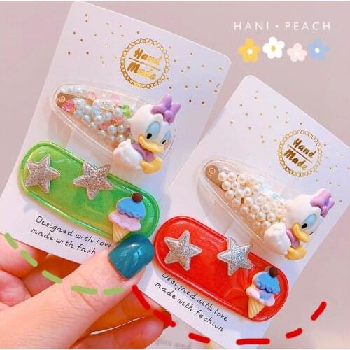 Disney cartoon Korea PVC transparent color round ball duck fluorescent bright surface childrens BB clip bangs clip summer doll