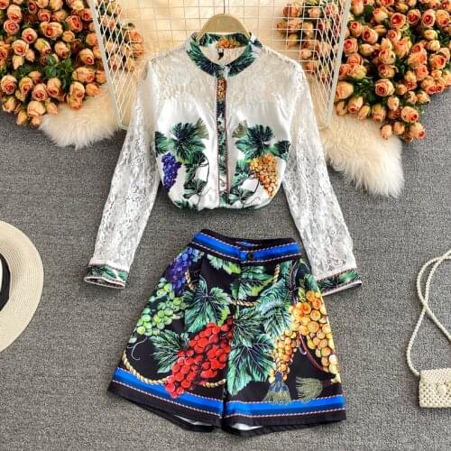Ladies temperament suit 2021 new female lace long-sleeved top design sense printed wide-leg shorts two-piece suit