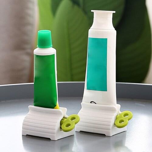 Toothpaste Tube Squeezer Easy Dispenser Rolling Holder Removable Easy to Clean Plastic Tooth Paste Press Roll Squeezer Tube