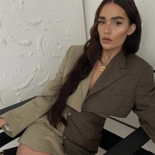 2021 autumn new European and American yin-yang design sense small suit coat irregular high waist skirt 2-piece suit