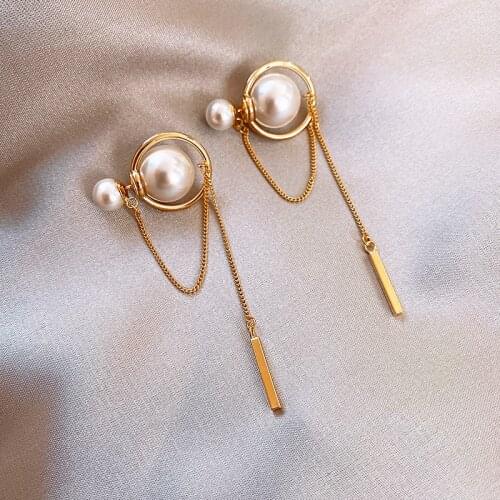 Korean hot selling fashion jewelry temperament pearls front and back wearing chain tassel creative female earrings