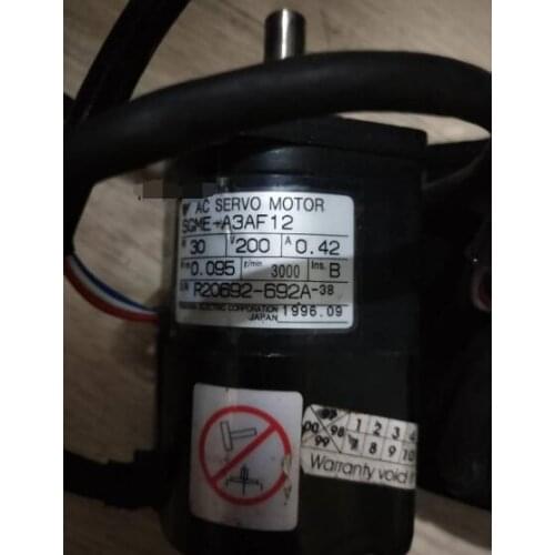 SGME-A3AF12 SERVO MOTOR , used in good condition . 80% appearance new , good working , free shipping