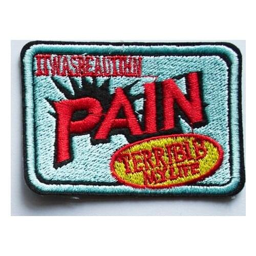 Hot! Terrible Pain Punk biker Embroidered Iron on Badge Patch (Size is about 6.8 * 4.8 cm)