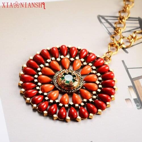 XIAONIANSHI New Big round Gold colour Pendant Necklace Resin and Crystal Sun shape Necklaces Trendy Vintage Jewelry For Women