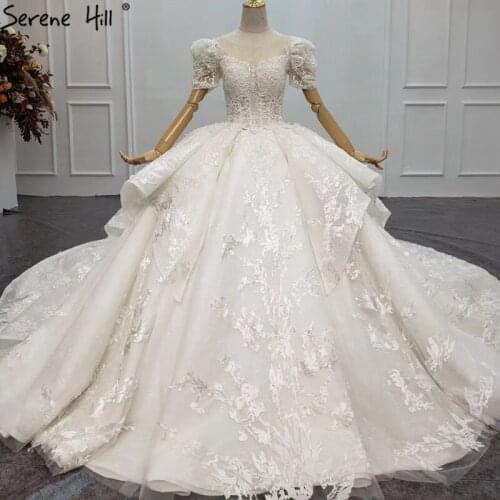 Ivory Puff Short Sleeves Luxury Wedding Dresses 2020 Dubai O-Neck Handmade Flowers Lace Bridal Gowns HX0183 Custom Made