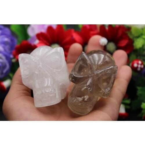 443 grams of 2 PCS natural quartz crystal skull to heal