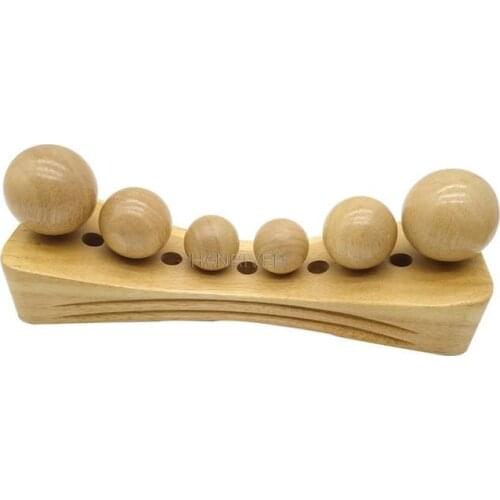 Solid wood lumbar spine massage pillow to relieve the wealth package to repair the lumbar spine adult special traction pillow