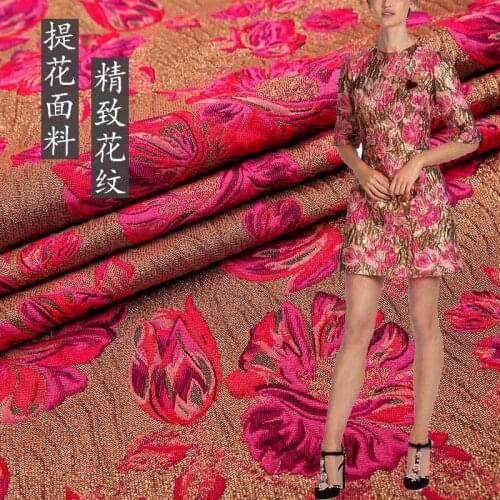 Gold silk embossed woven jacquard fabric autumn and winter clothing dress windbreaker high-grade brocade fabric