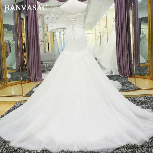 BANVASAC 2017 New Mermaid Elegant Embroidery Strapless Wedding Dresses Sleeveless Satin Sweep Train Lace Bridal Gowns