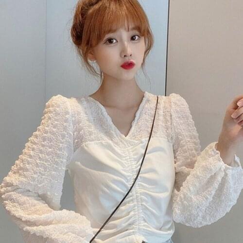 The new 2021 autumn Korean version of Joker Slim Stitching Knitted Shirt Womens Design Sense Drawstring Short Long Sleeve Shirt