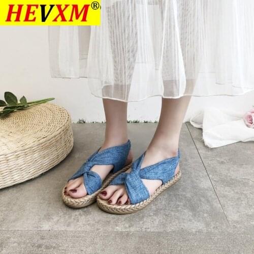 Summer 2021 Korean version of the new fashion casual sandals wear straw woven linen Roman sandals elastic band cross flat shoes