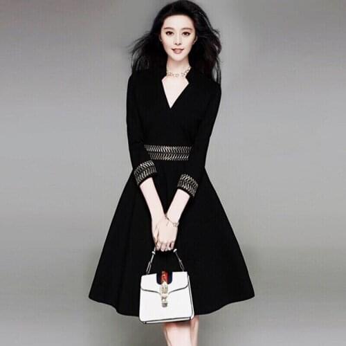 Temperament goddess profession OL high waist was thin V-neck seven-point sleeve Hepburn style Womens clothing new black dress
