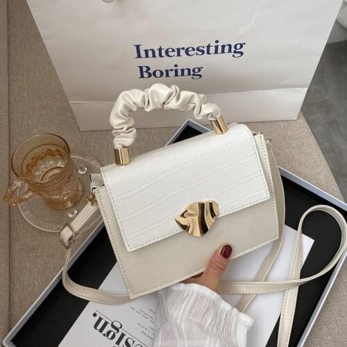 On the new French minority popular fold hand oblique cross bag woman 2021 new trend all-match single shoulder cross-body bag