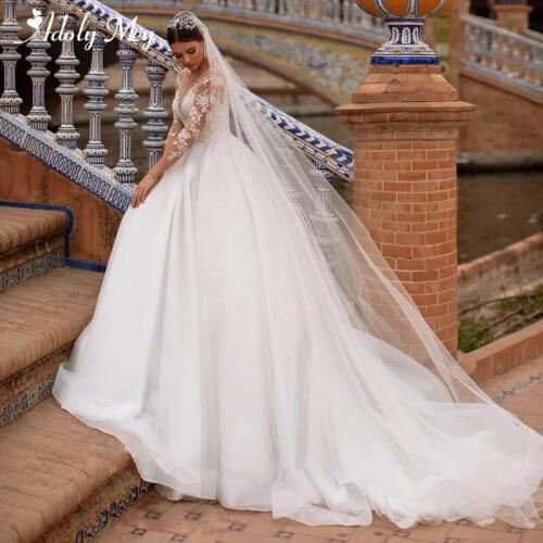 Adoly Mey Luxury Scoop Neck Beaded Long Sleeve A-Line Wedding Dresses 2021 Gorgeous Appliques Court Train Princess Wedding Gown