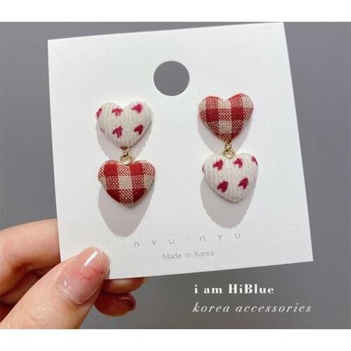 New Korean fashion fabric color matching high-end sense of elegant temperament and all-match sweet peach heart female earrings