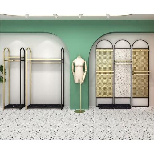 Clothing store display rack floor type simple modern black gold high grade shopping mall decoration special shelf display rack