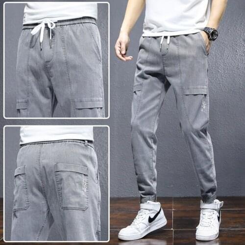 2021 spring autumn quality brand mens fashion casual cotton loose denim harem pants mens slim Solid color elastic lace-up jeans