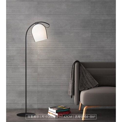 Simple and personalized sofa vertical lamp Creative designer model bedroom study floor lamp