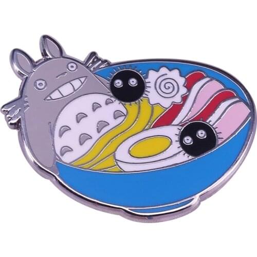 Ghibli Inspired Brooch This plump Totoro is chilling in a bowl of ramen, topped with soot sprites and all the good stuff