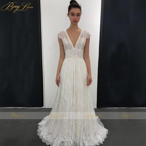 2020 Boho Lace Wedding Dresses Long A Line V Neck Cap Sleeves Bridal Gowns vestido de noiva Sexy V Neck Bride Dress Open Back