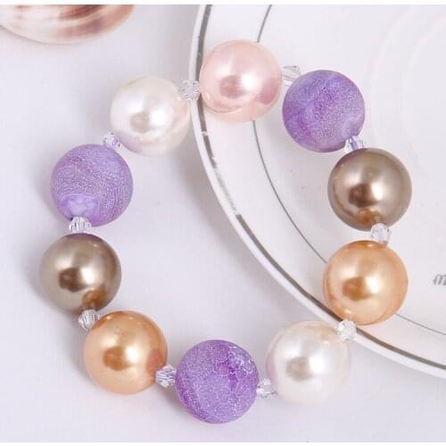 Top fashion bracelet made of sea-shell pearl bracelet and color beads