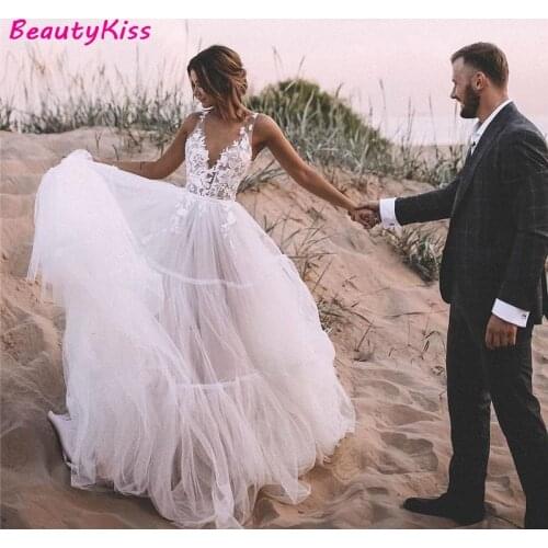 A-Line Beach Wedding Dress Boheimian Deep V-Neck Appliques Lace Tulle Princess Bridal Dresses Sexy Backless Boho Wedding Gowns
