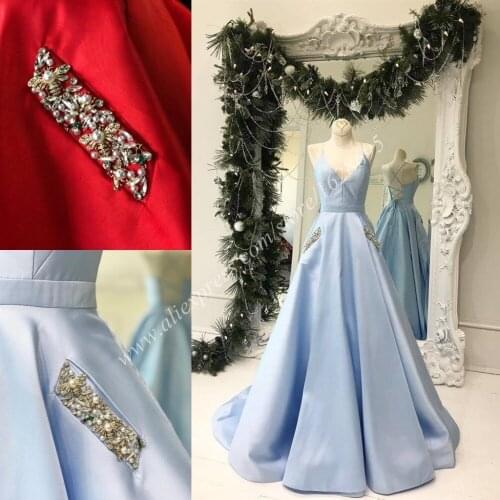 Light Sky Blue Prom Dresses 2019 Spaghetti Neck A Line Famous Designer Long vestidos de festa Red with Beading Pockets